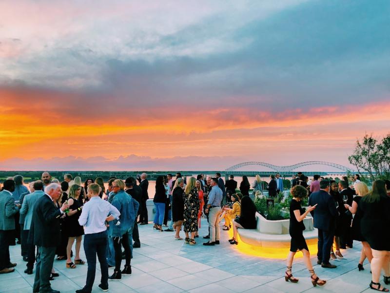 crowd of people on top fo the roof at beck and call