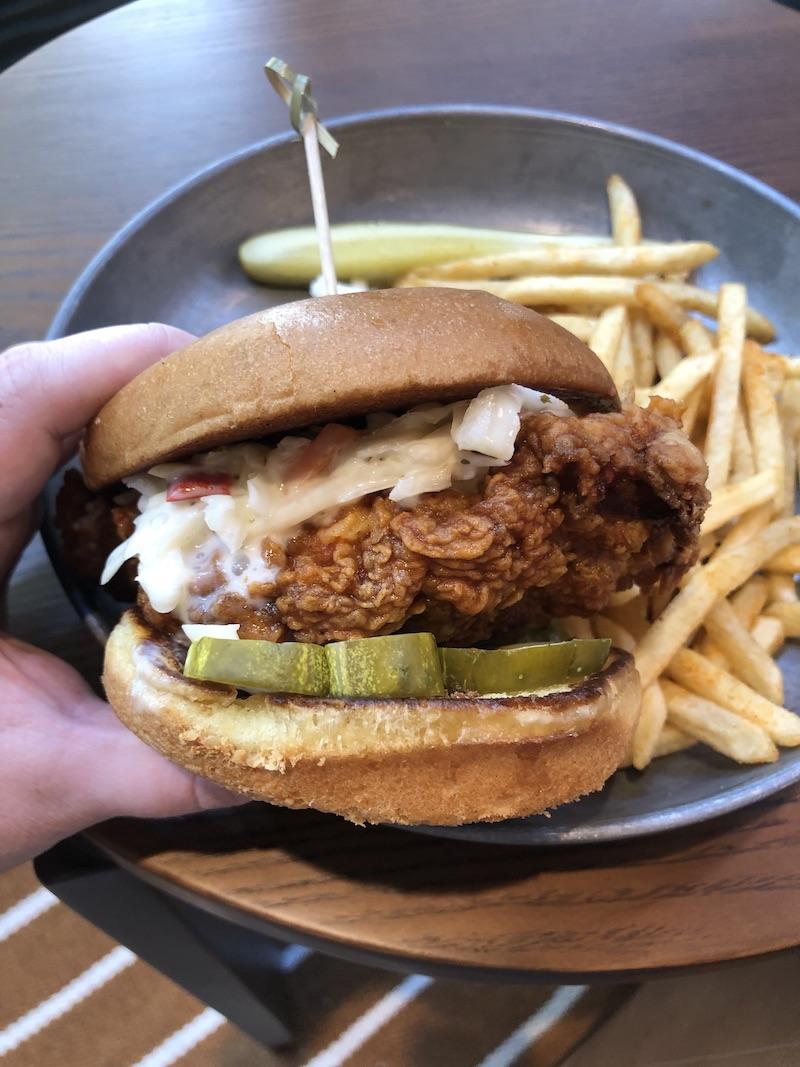 chicken sandwich with slaw and pickels