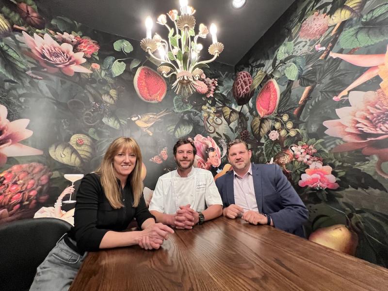 three people sitting in private room at Restaurant Iris