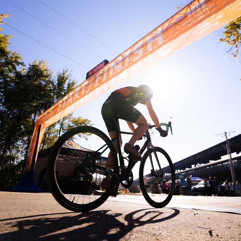 biker crossing finish line