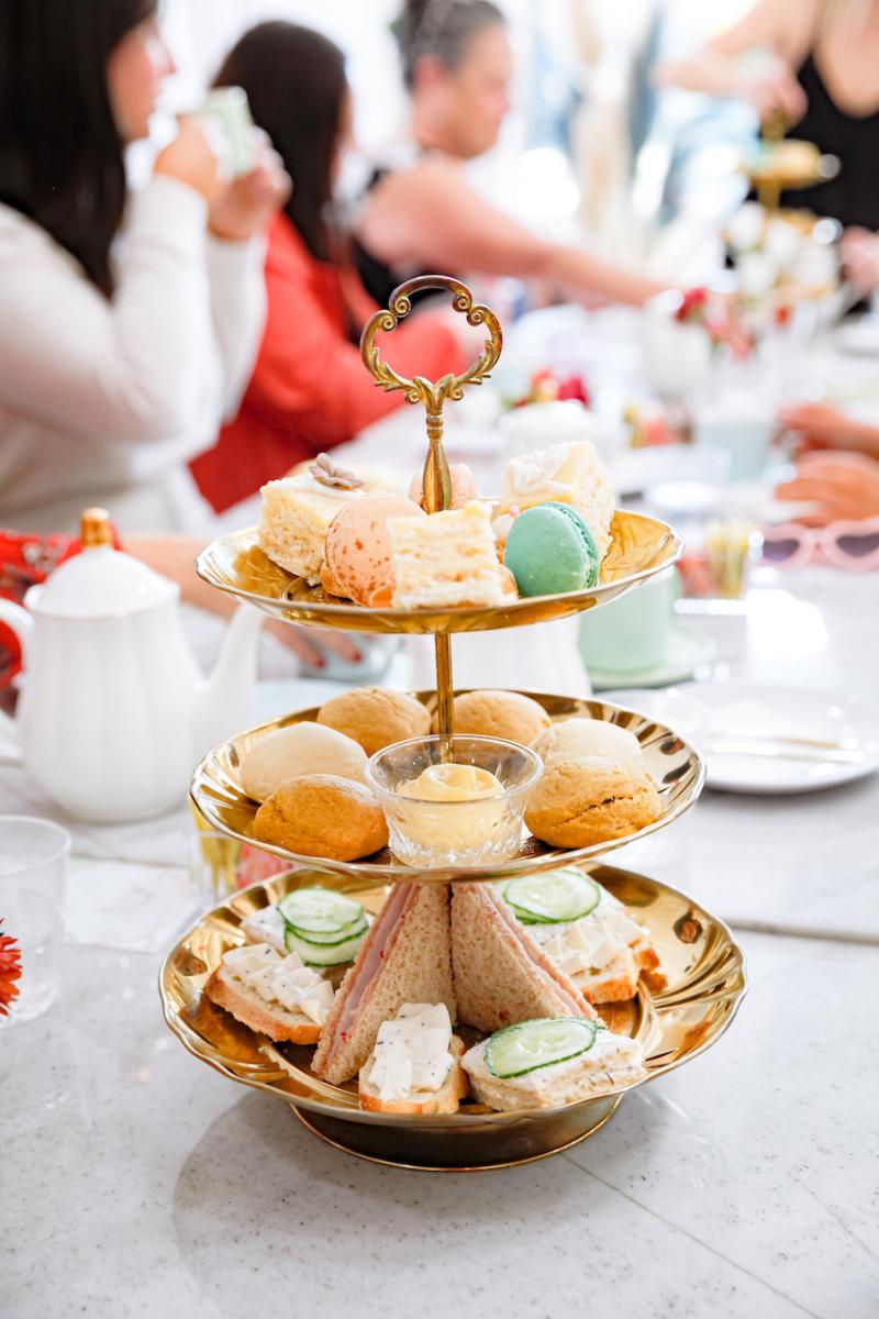 a three tier case of treats from 17 Berkshire sits on a table