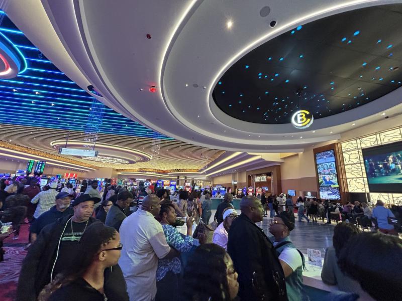 people standing in casino bar