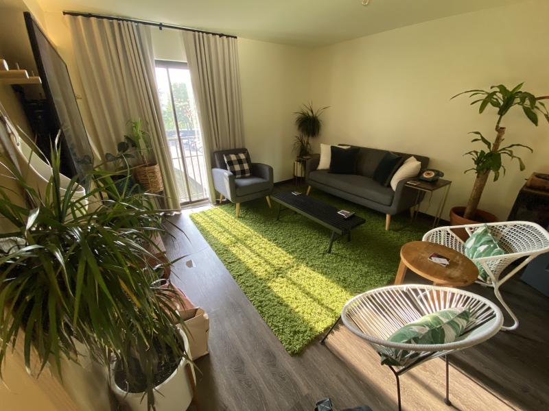 living room set-up in moxy hotel room suite