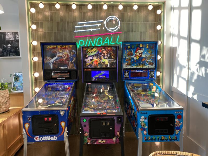 three pinball machines