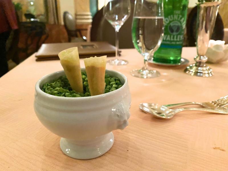 two pieces of amuse bouche in bowl