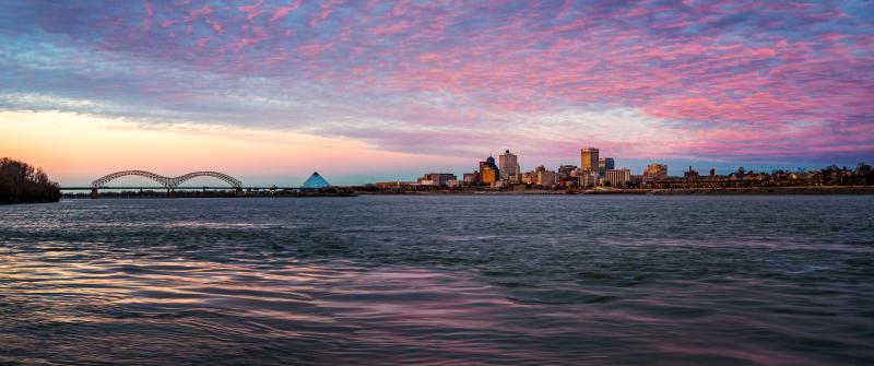 shot from far away of memphis skyline and bridge