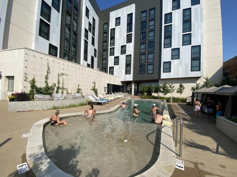 view of pool at at centric with the hotel in background