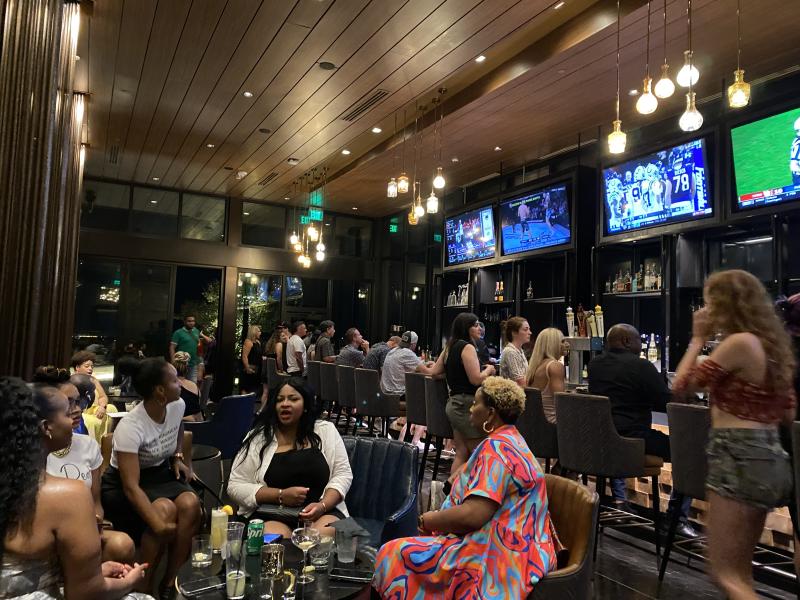 interior or beck &amp; call bar filled with people