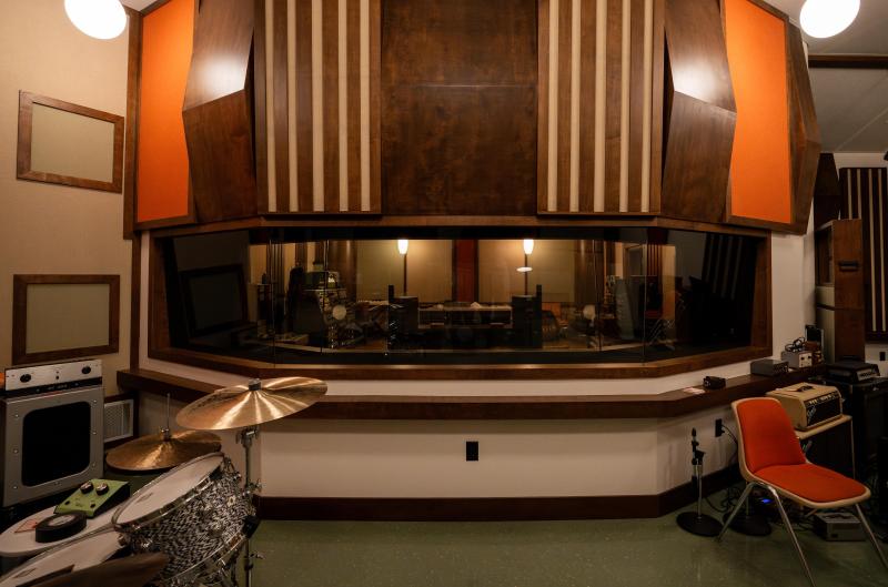 looking into recording booth from studio