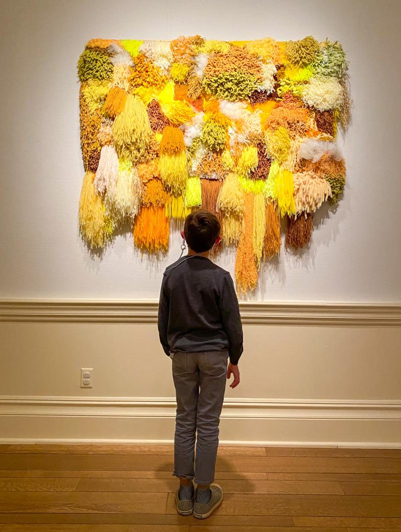 Kid enjoying art at The Dixon