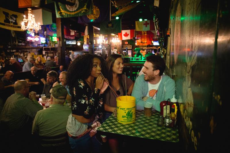 people hanging out inside drinking the diver