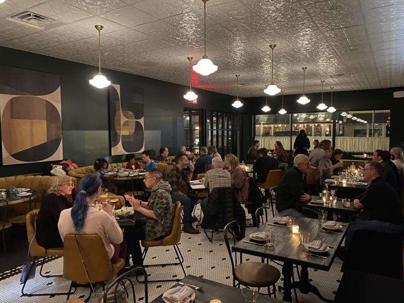 dining room of the public bistro full of people eating