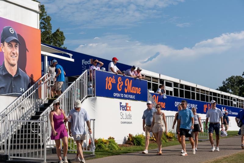 18th &amp; Mane fan experience set up at the FedEx St. Jude Championship, with spectators walking by it.