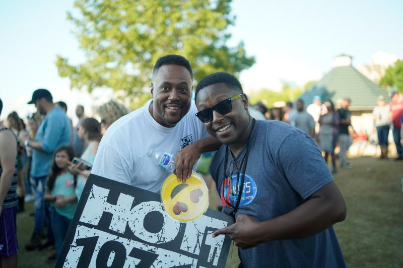 two men smiling at camera