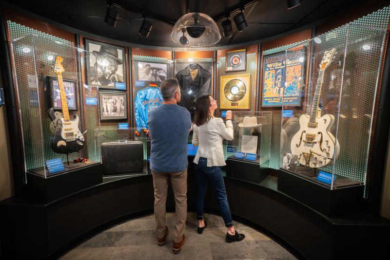 Couple exploring the Blues Foundation's Blues Hall of Fame.