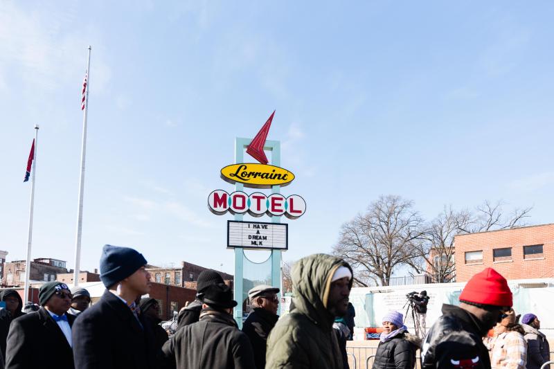 Lorraine Motel sign in the background of crowd going into National Civil Rights Museum