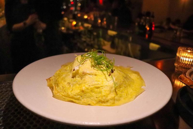 crab fried rice dish topped with egg at Bao Toan