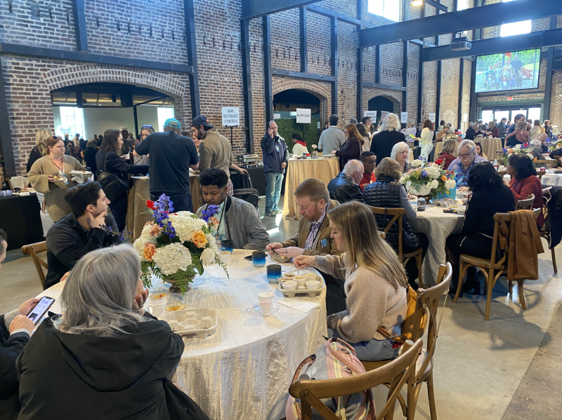 crowd of people gathered at soup Sunday