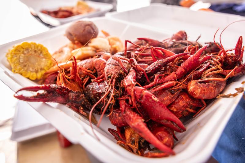 up close pic of crawfish in to-go box