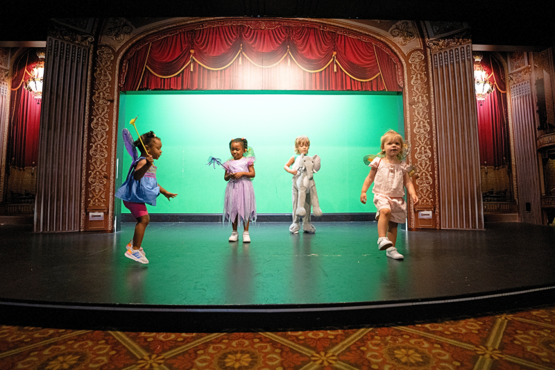 kids play on theatre stage at children's museum of memphis
