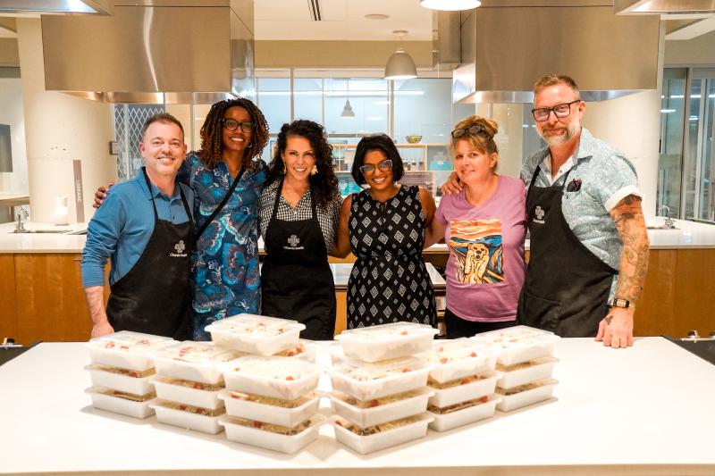 group posing while volunteering