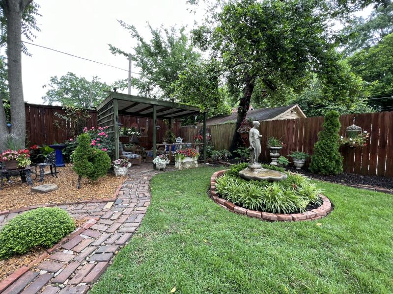backyard with gardens, gazebo setting and water fountain in Cooper-young neighborhood