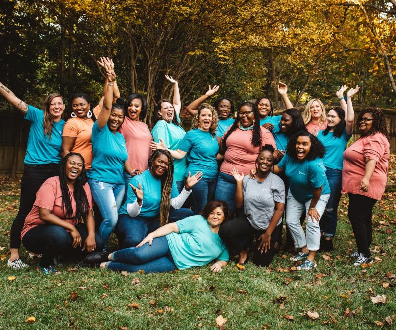 group photo of restore corps team