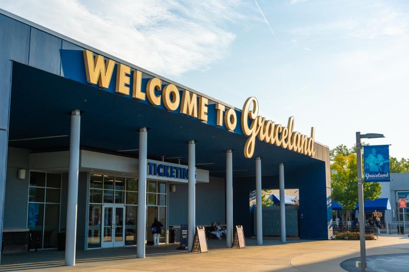 entrance to graceland exhibition center with &quot;welcome to graceland&quot; sign