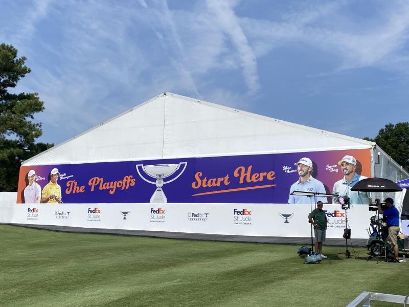 "the playoffs start here" sign with golfers represented