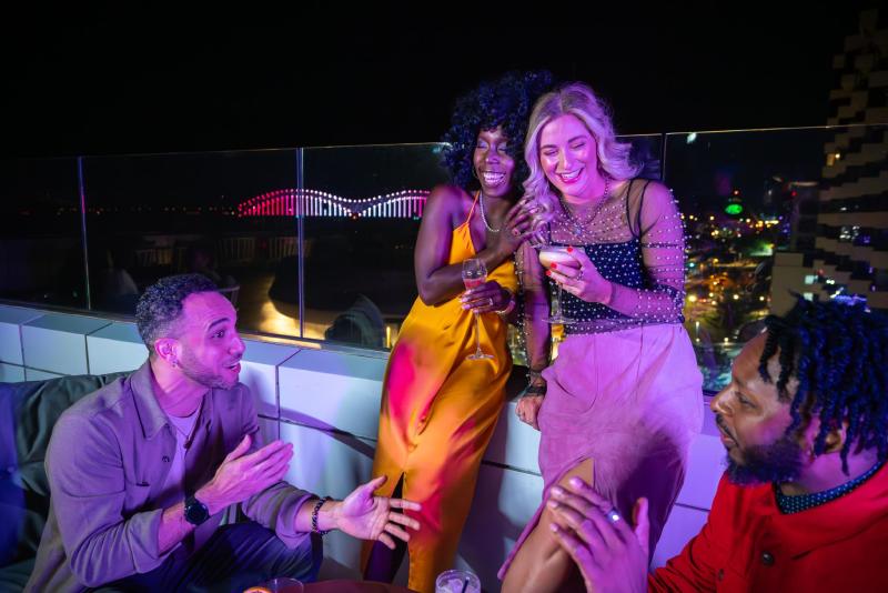 Friends at the rooftop bar Beck &amp; Call at Hyatt Beale Street Memphis