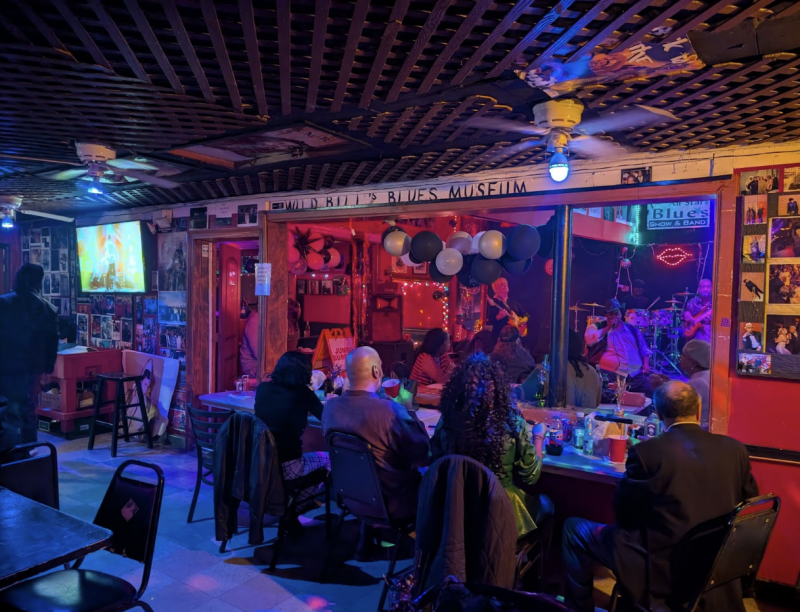 people sitting and listening to music