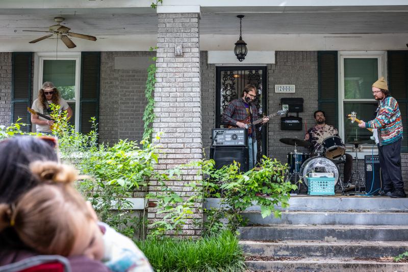 band performs on porch during porchfest