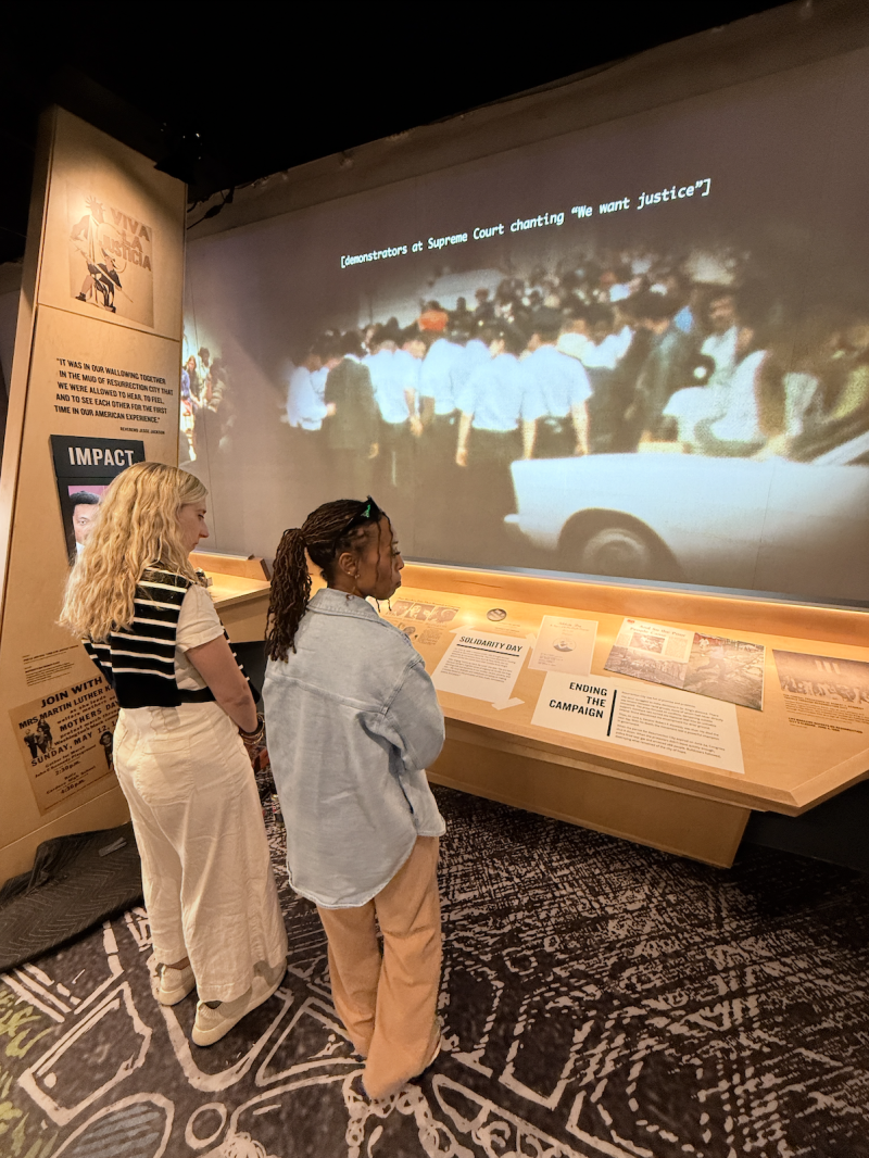 two women view poor people's campaign exhibit at NCRM's new Legacy Experience expansion