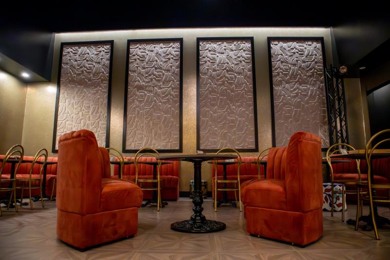 red sound seating and tables in Hattiloo's new culture box space
