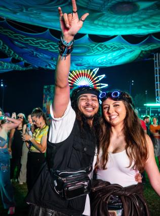 couple poses for photo at riverbeat