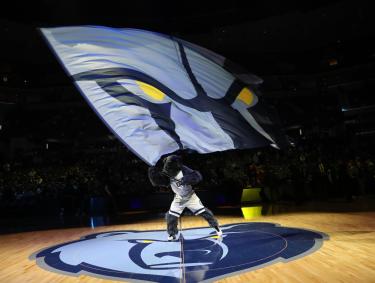 Grizz waving Memphis Grizzlies flag