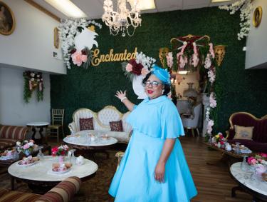 owner of enchanted tea lounge poses for photo