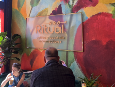 colorful mural painted on wall at new Ritual bistro
