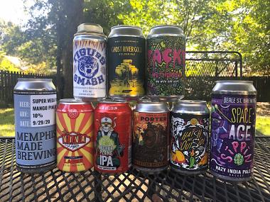 stack of local Memphis beer cans on a table