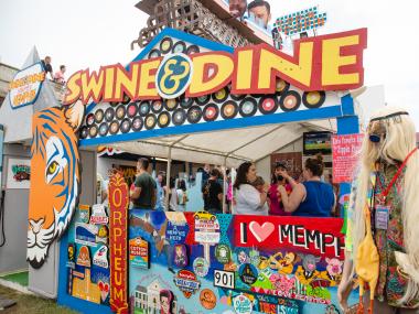 Swine &amp; Dine booth at World Championship Barbecue Cooking Contest.