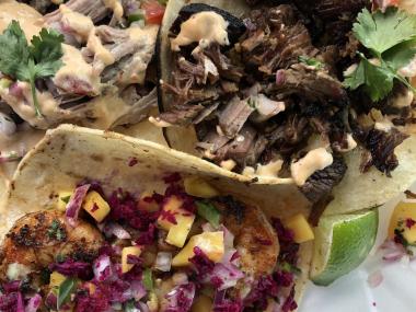 three street tacos with toppings