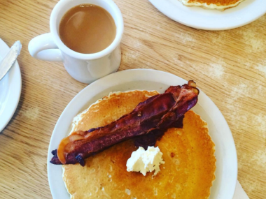 pancake with slice of bacon and coffee at the Pancake Shop