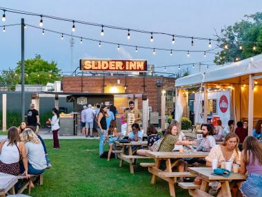 crowd at outdoor patio venue