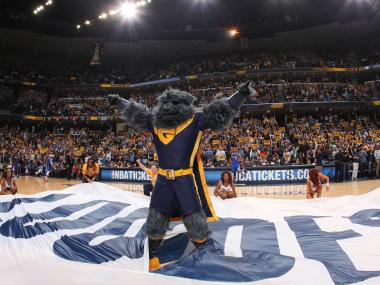 Memphis Grizzlies mascot Grizzlies stands in the middle of court during basketball game