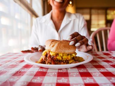 pulled pork sandwich with slaw on plate