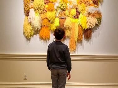 Kid enjoying art at The Dixon