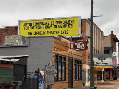 Justin Timberlake Concert Announcement via yellow billboard with plain text on Beale Street