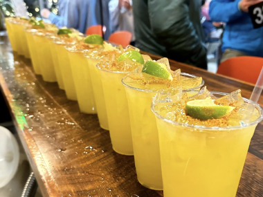 many margaritas lined up in a line