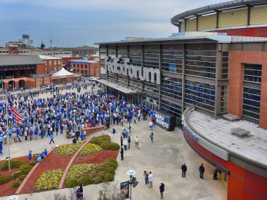 people file into Fedex forum from outside for march madness