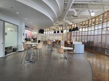 lobby with tables and chairs for working spaces in Epicenter